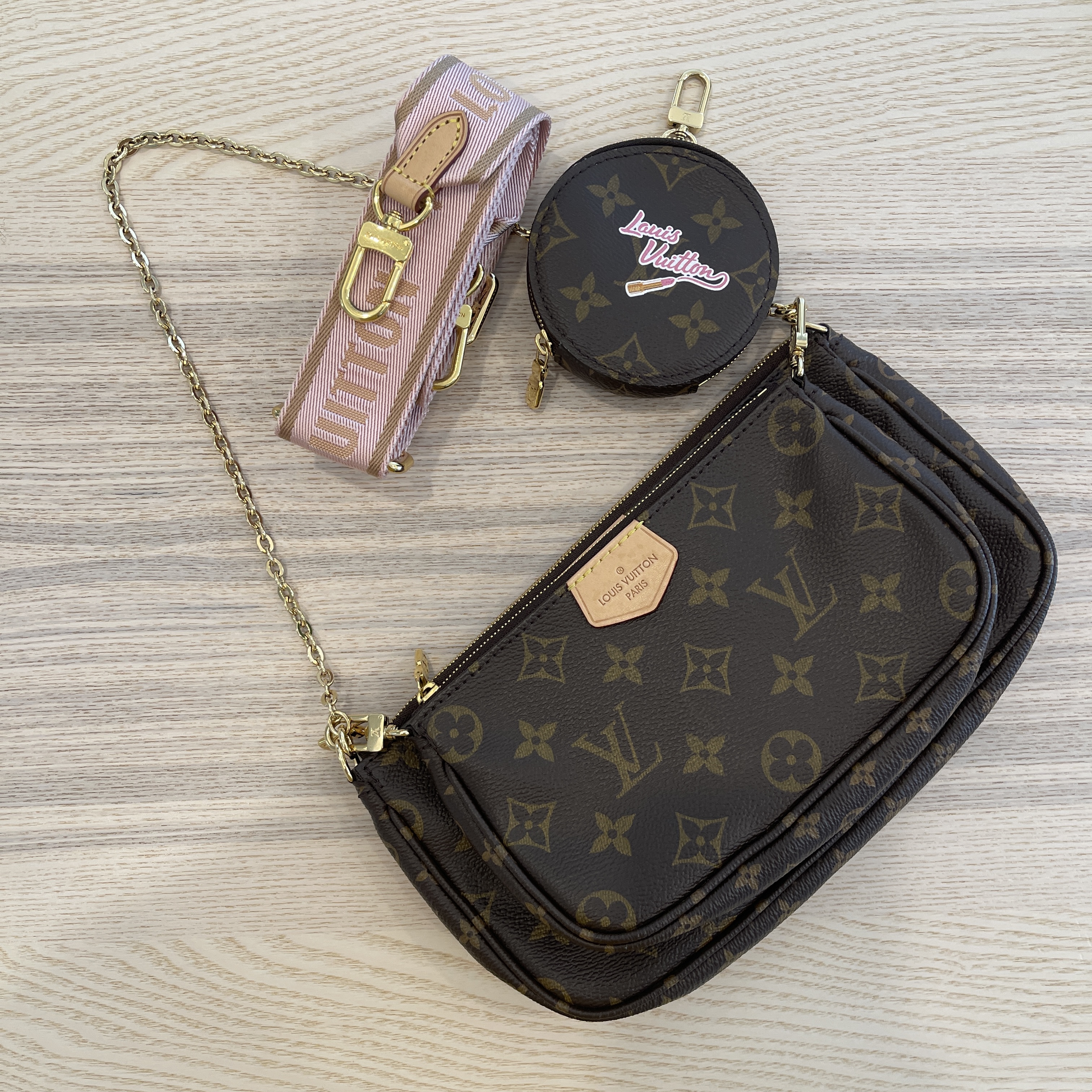 Louis Vuitton Multi Pochette Accessoires with Rose Clair Strap, personalised  My LV World Tour Sticker (Manga Cat)