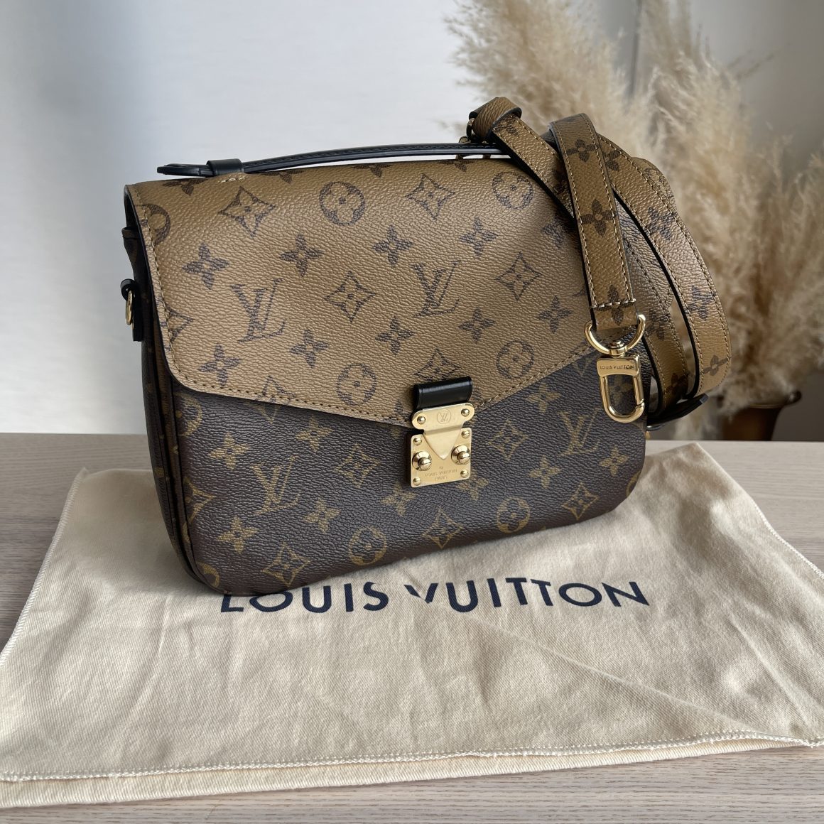 Authentic Brand New Louis Vuitton Pochette Métis Monogram Reverse