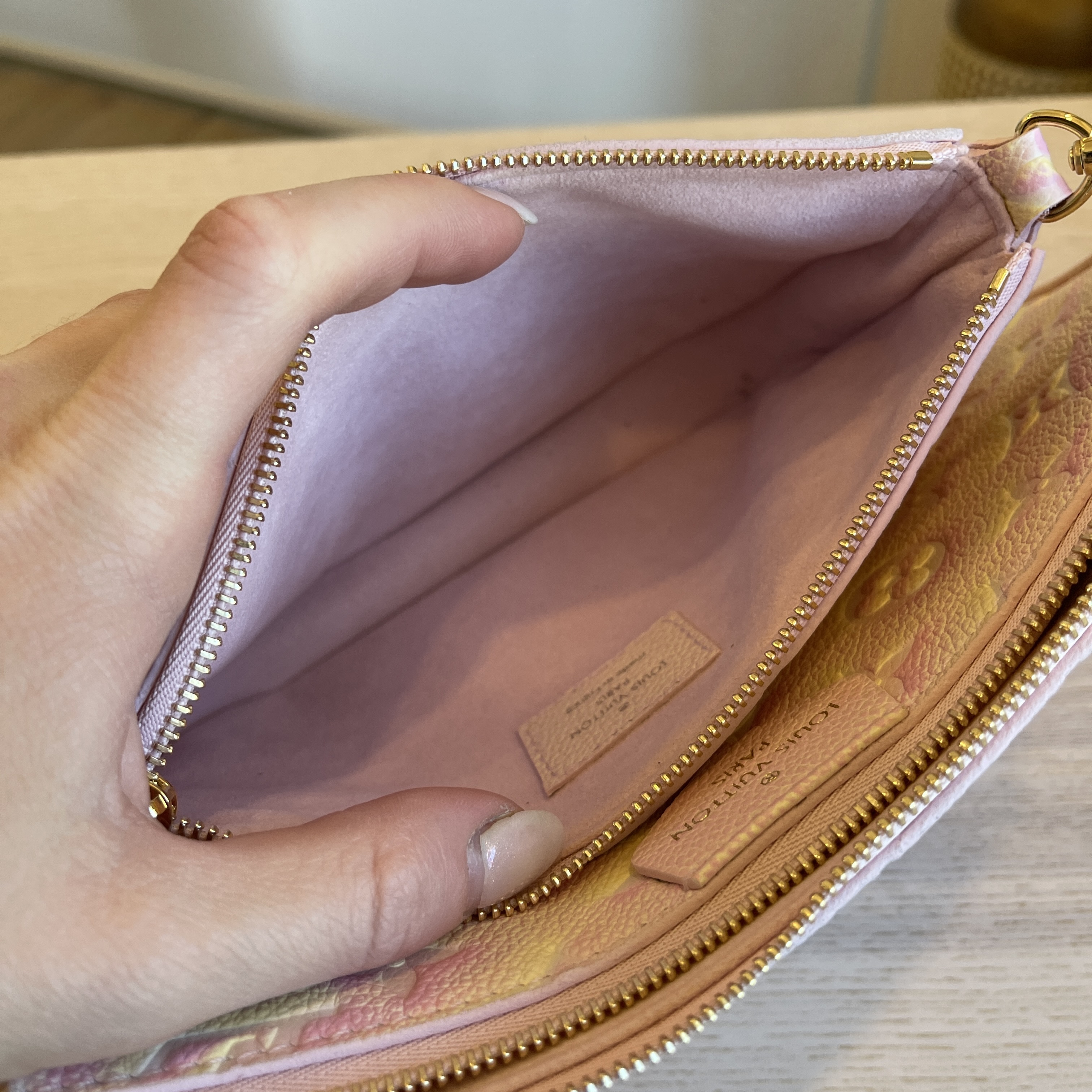 Louis Vuitton Light Pink Monogram Empreinte Leather Summer Stardust Multi-Accessories  Pochette Bag - Yoogi's Closet