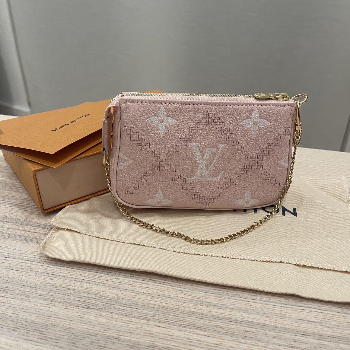 Louis Vuitton Pink Giant Monogram Empreinte broderies Mini Pochette Accessories Gold Hardware, 2022 (Like New), Womens Handbag