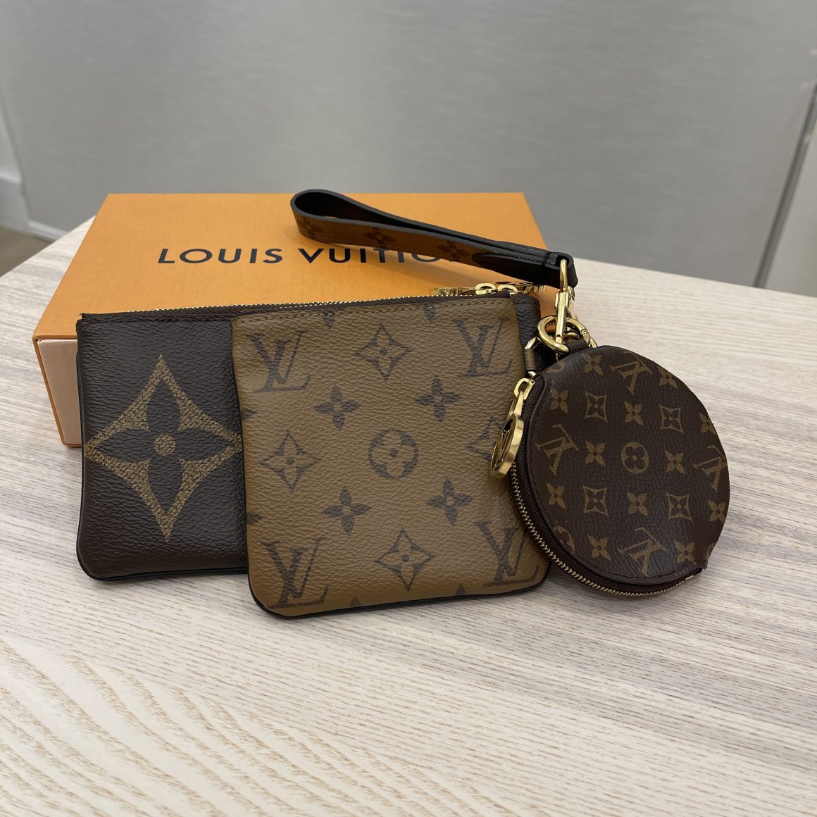 Louis Vuitton Trio Pouch Pink/Vert d'eau Green/Lilas Purple in Grained  Cowhide Leather with Gold-tone - US