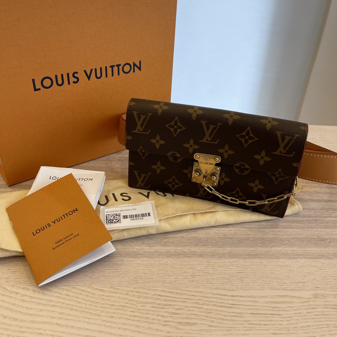 Louis Vuitton LOUIE VUITTON S LOCK BELT POUCH MM Brown - $350 (12% Off  Retail) - From Kaitlyn