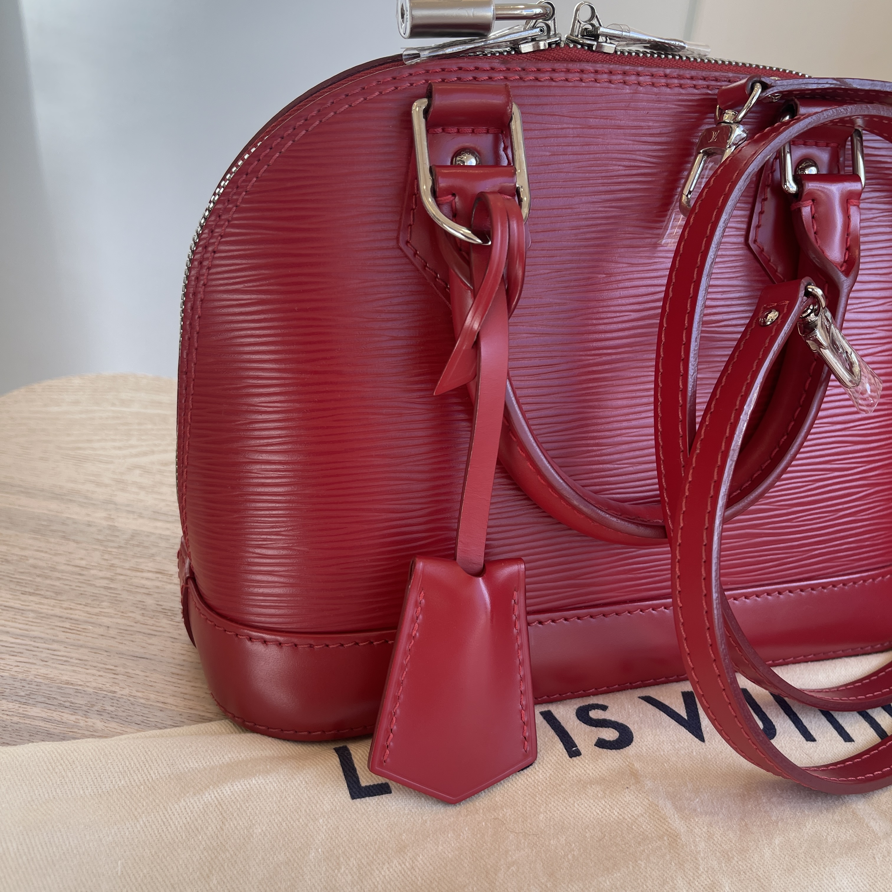 Louis Vuitton Fuchsia Ostrich Alma BB Bag For Sale at 1stDibs