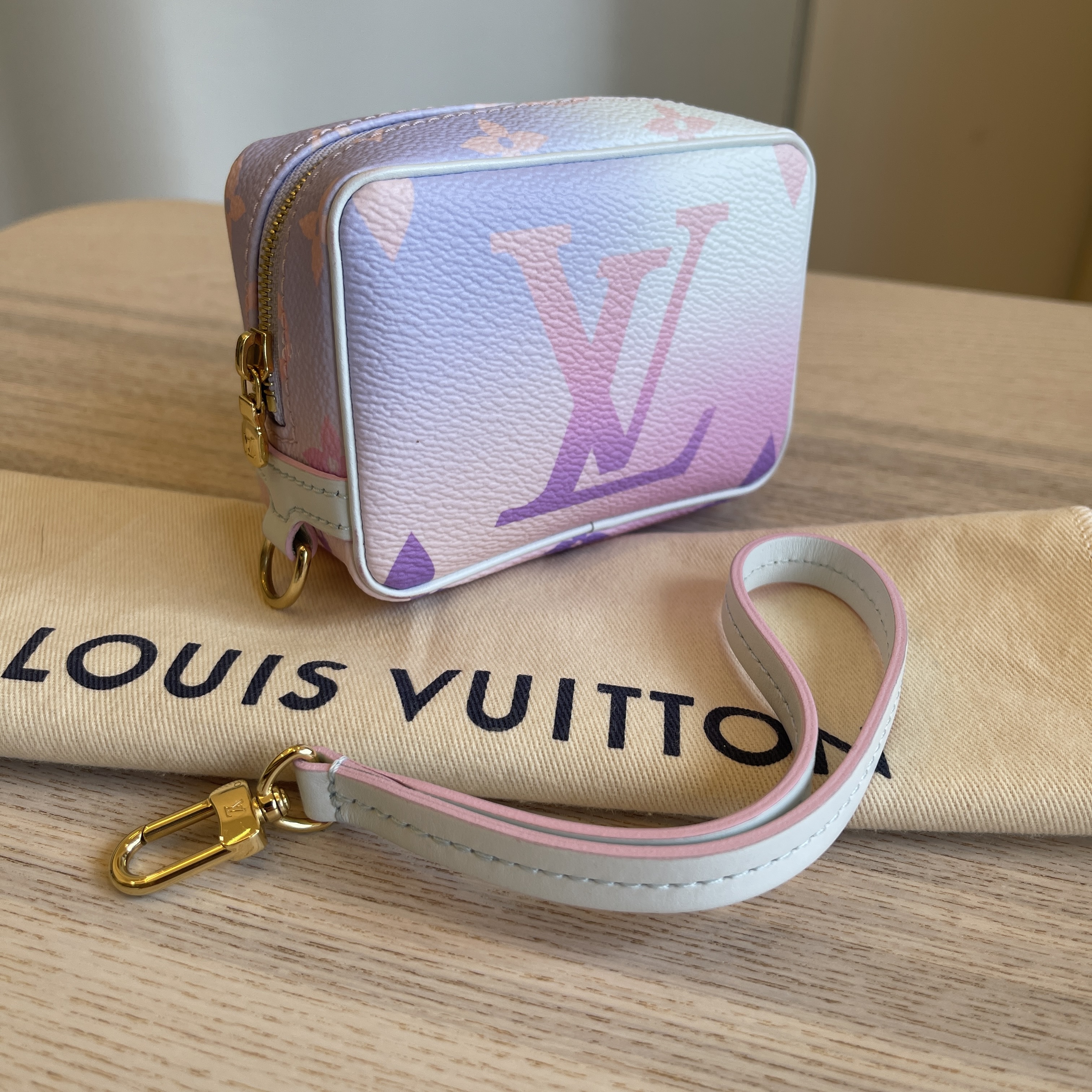 LOUIS VUITTON 2022 Monogram Sunrise Wapity Case *New - Timeless Luxuries