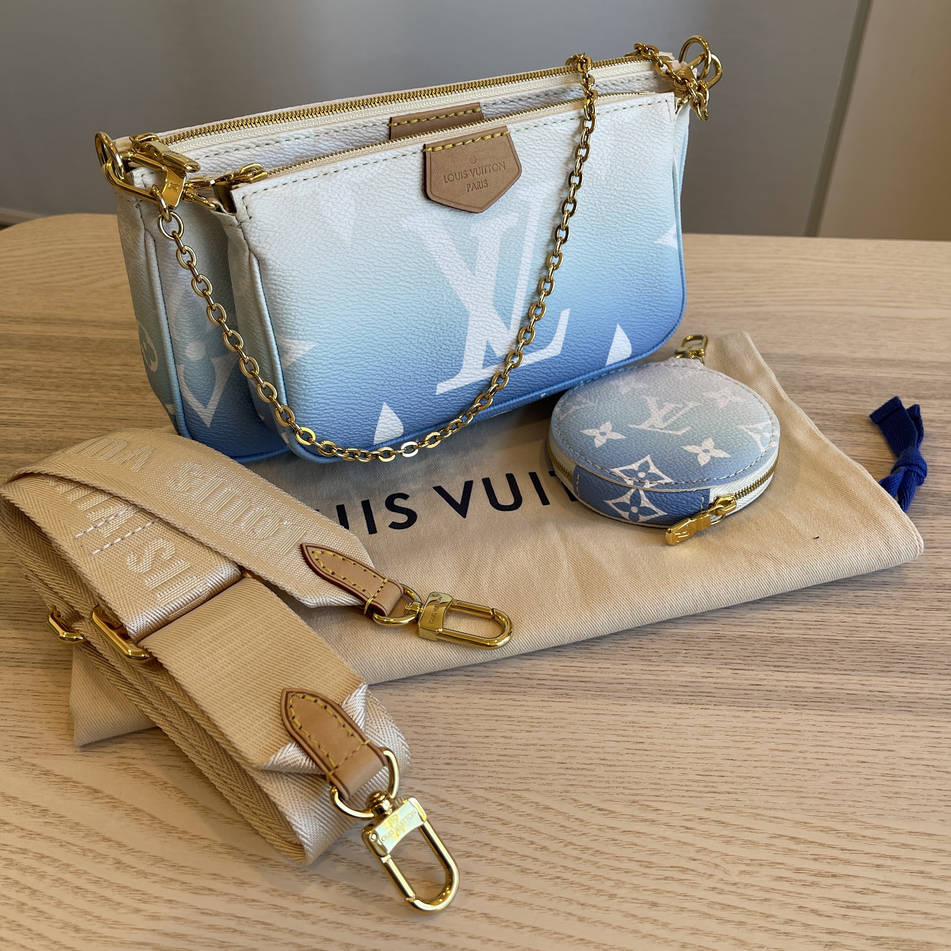 lv multi pochette by the pool