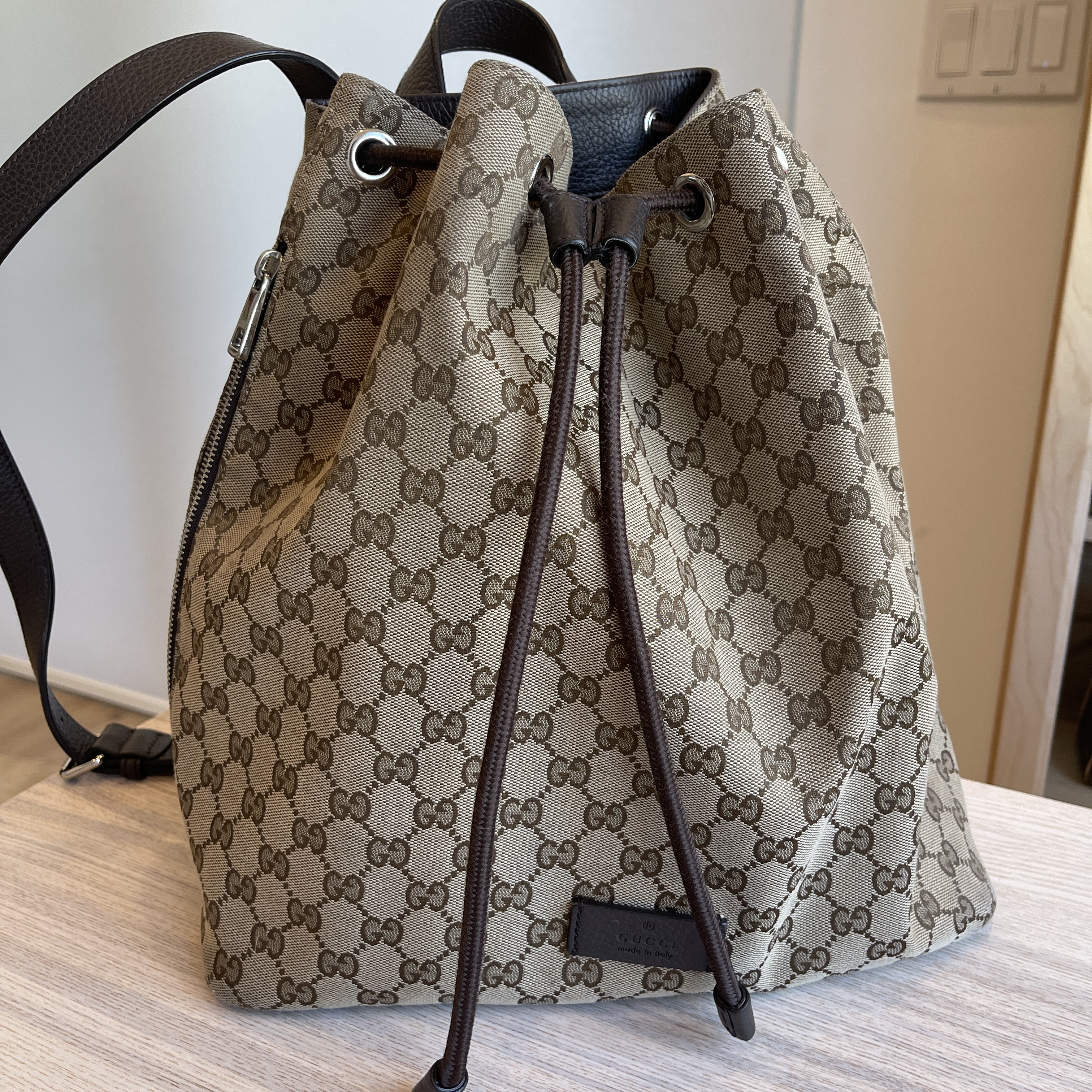 Gucci monogram drawstring bag brown