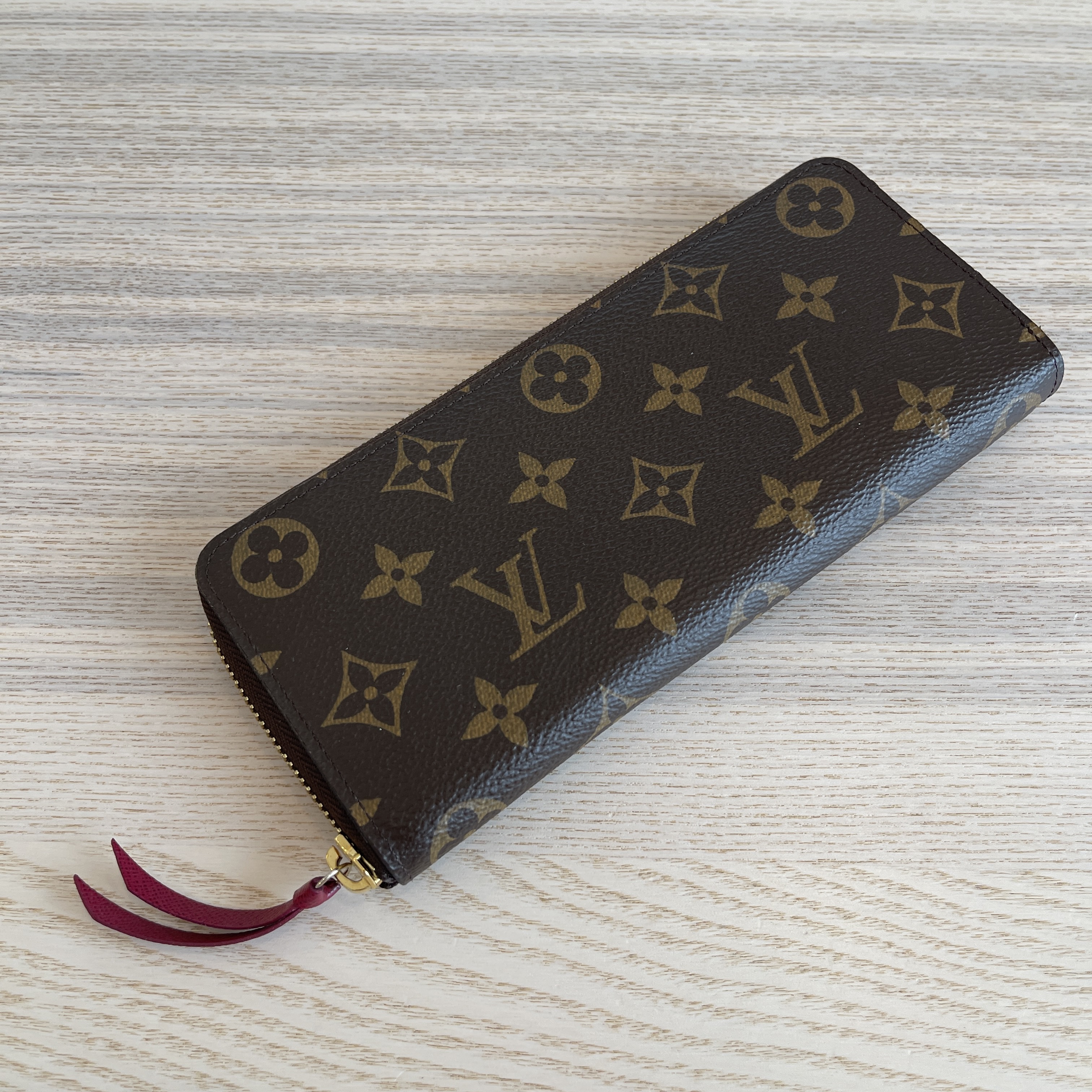 HER Authentic - Louis Vuitton Monogram Clemence Wallet in fuchsia.  Purchased new in November 2020. Can pass as new. $540. Available on our  website.