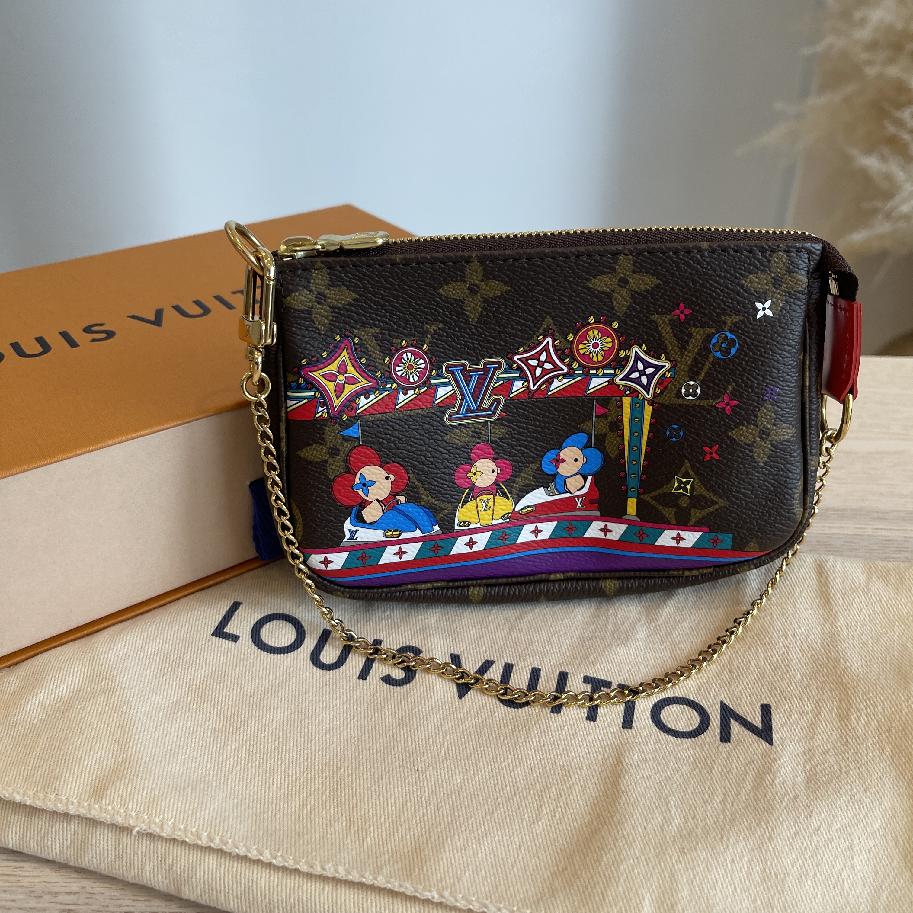 Louis Vuitton 2022 Christmas Animation Monogram Mini Pochette