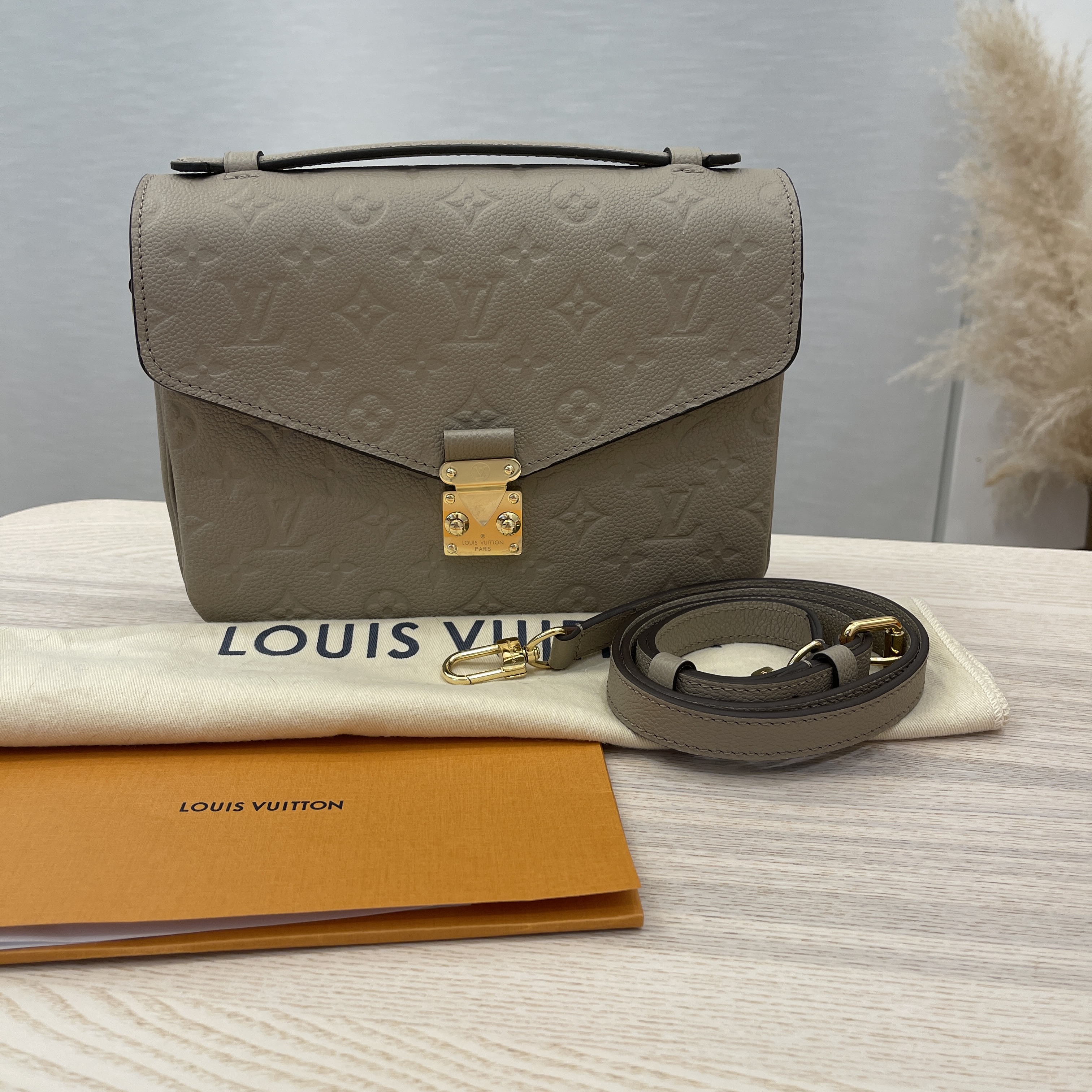 Louis Vuitton Pochette Métis Monogram Empreinte Leather Tourterelle