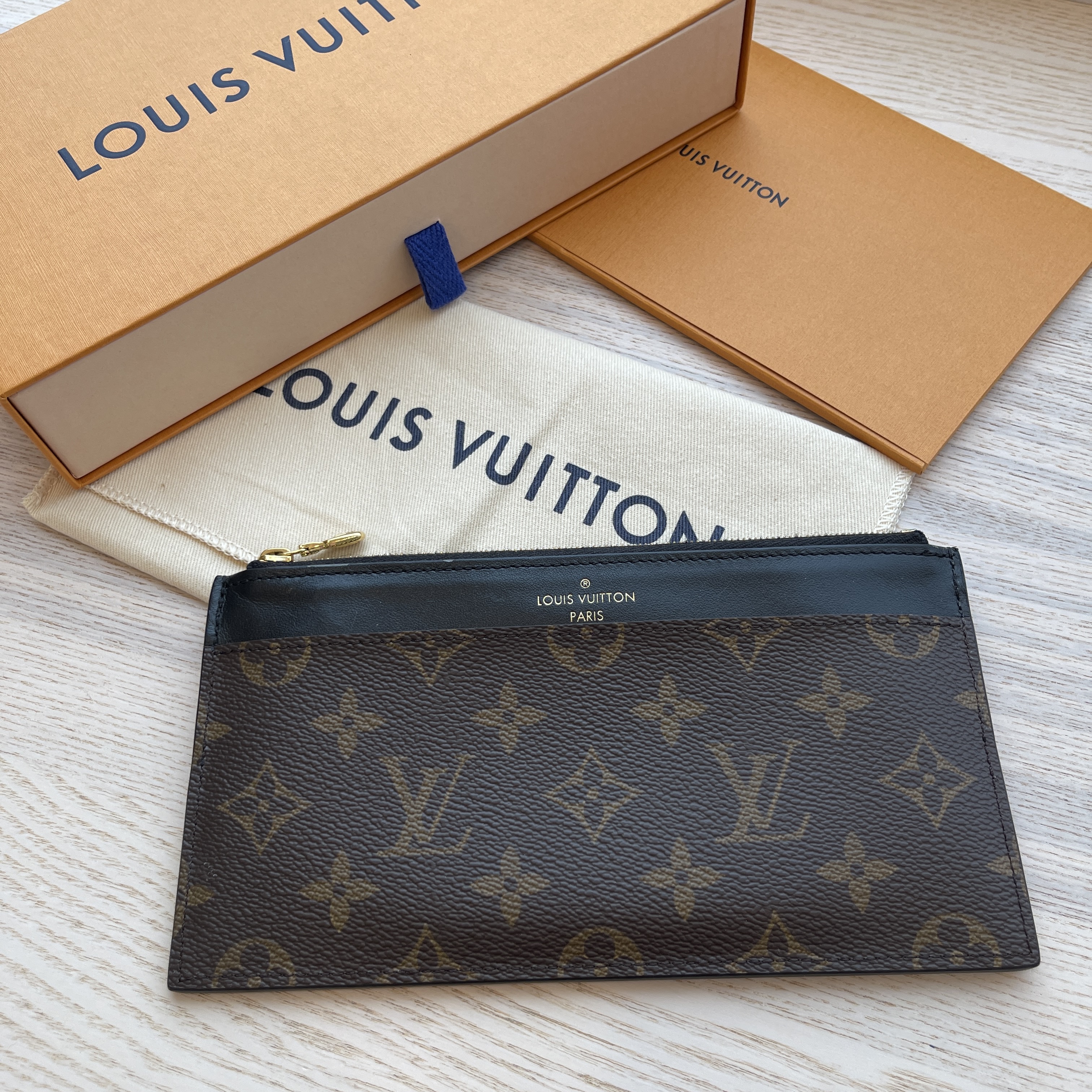 Louis Vuitton Slim Purse Reverse Monogram Canvas - ShopStyle