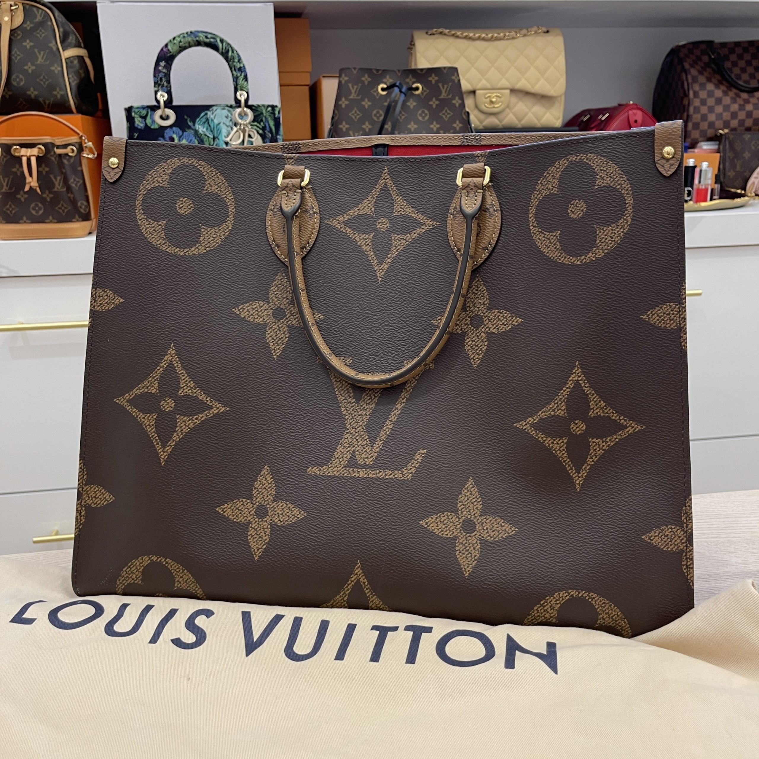 Louis Vuitton Reverse Monogram Onthego Gm in Brown