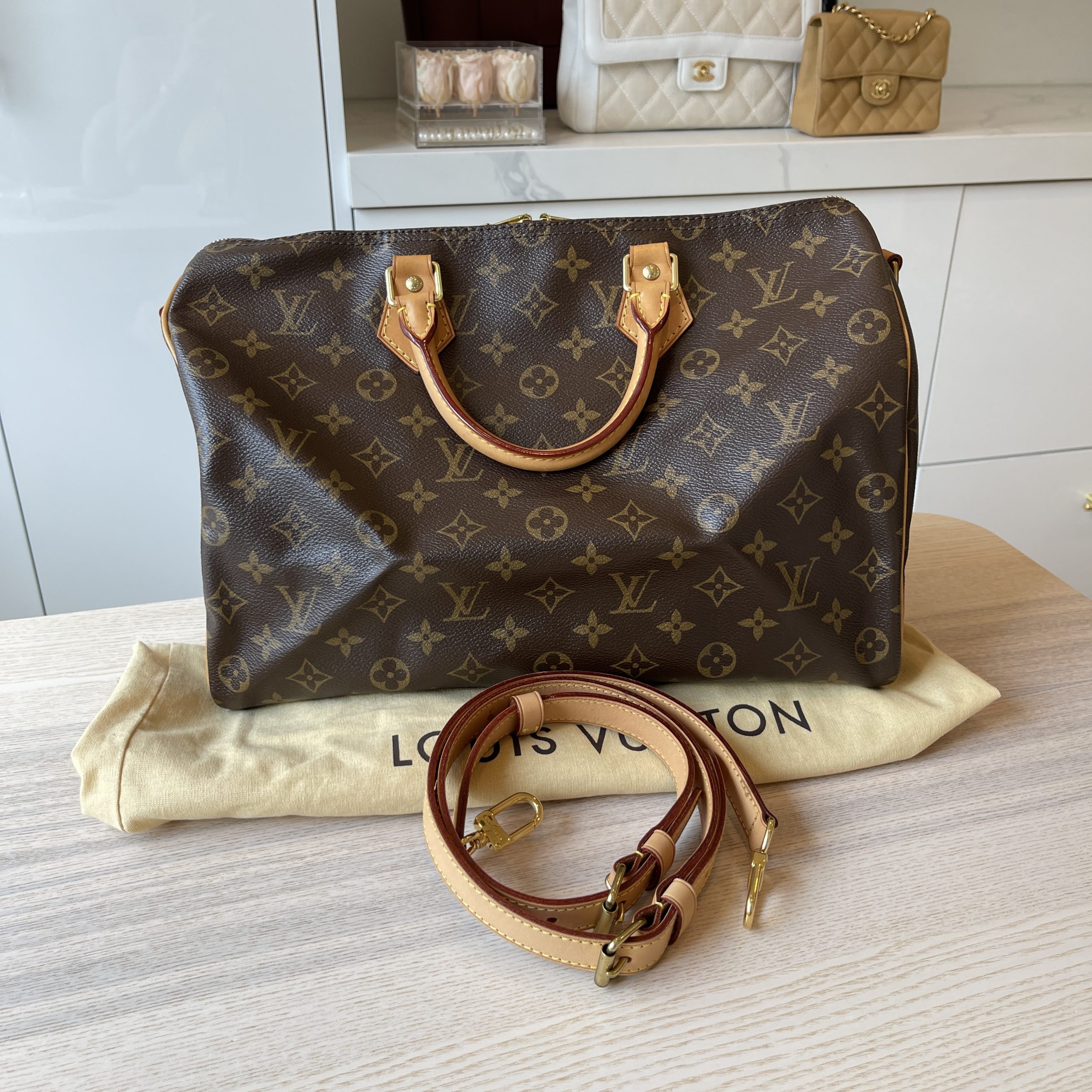 Louis Vuitton, Bags, Silver Lv Lock Key 35