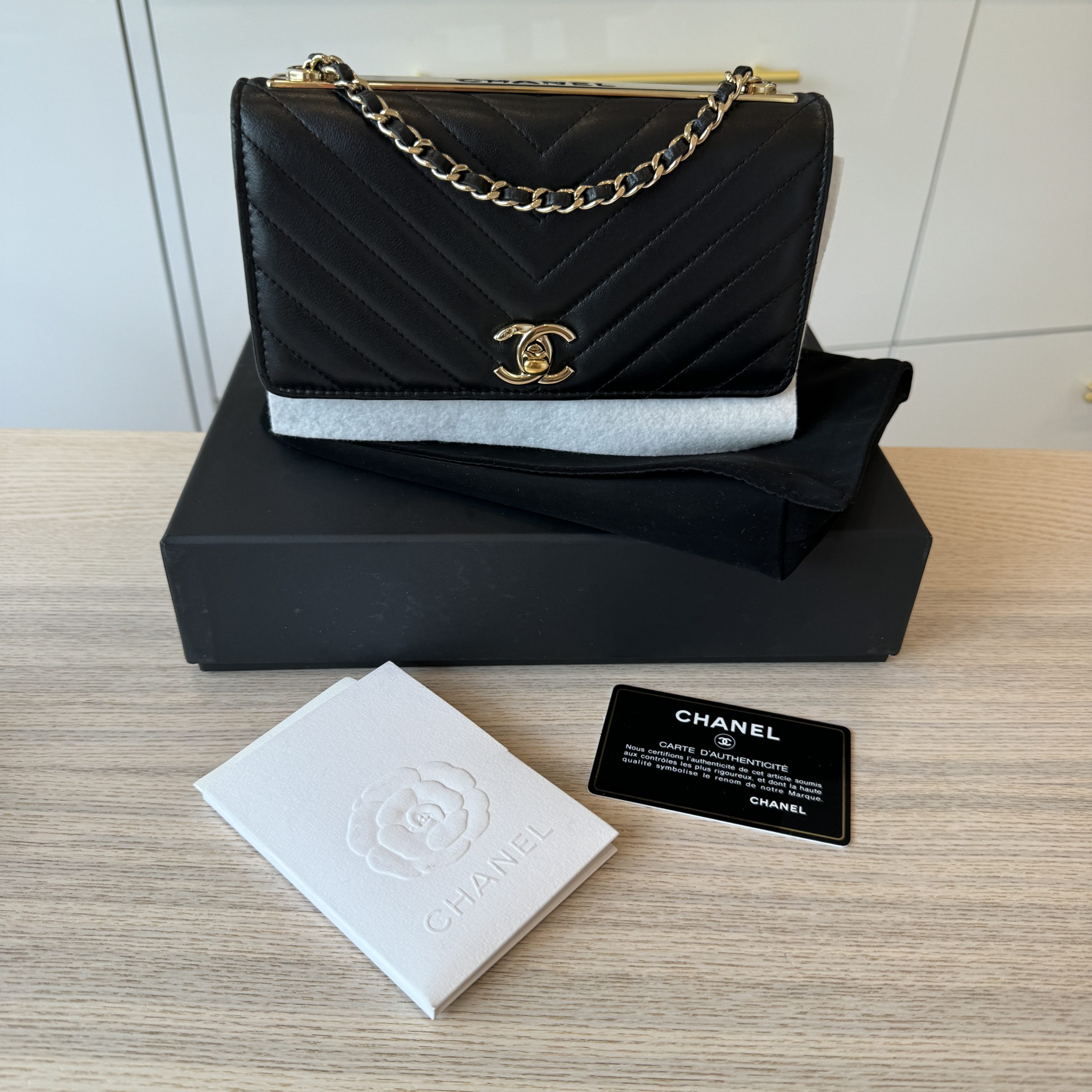 Chanel Trendy CC WOC Wallet on Chain Chevron Navy Lambskin Gold Hardwa –  Coco Approved Studio