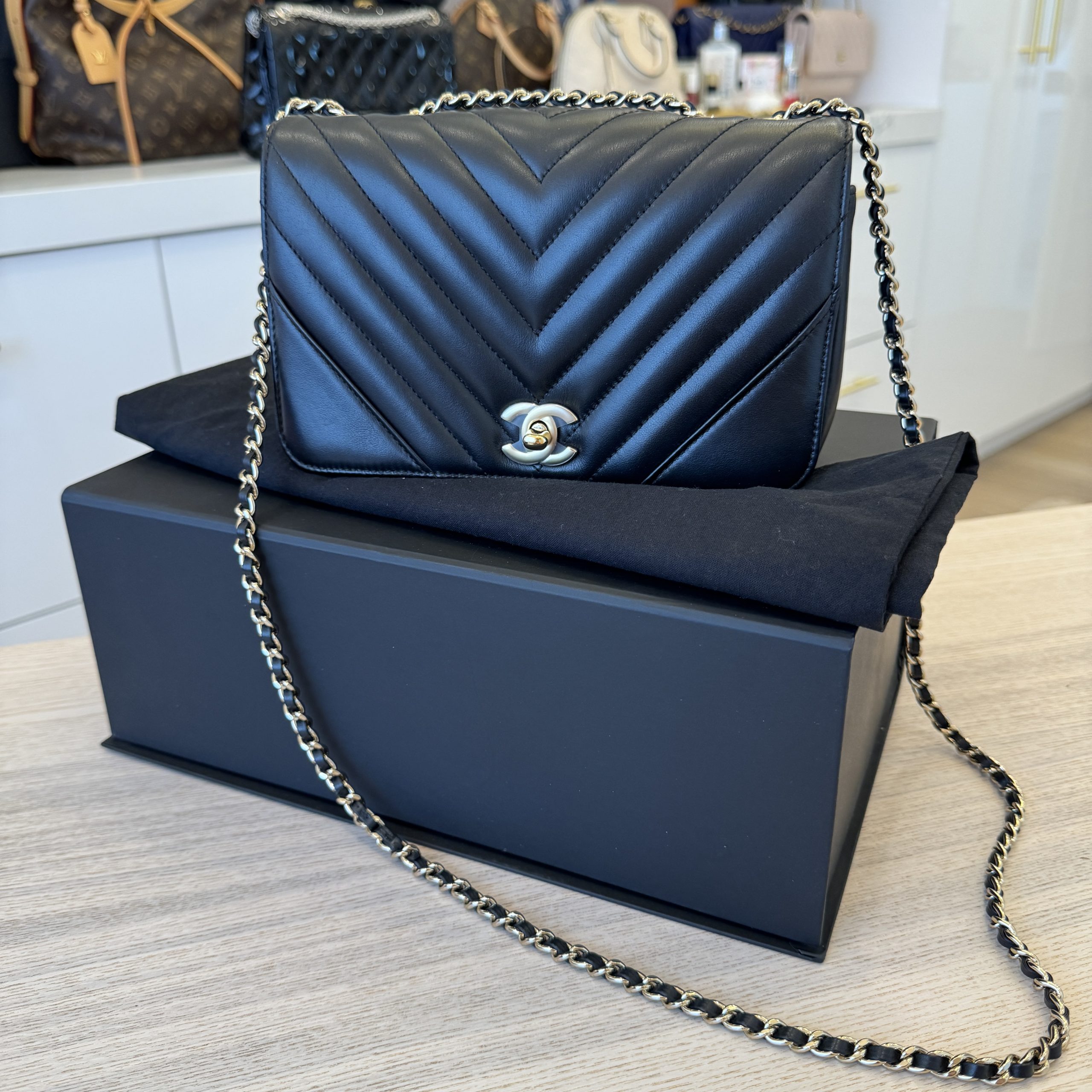 Chanel chevron statement bag price deals