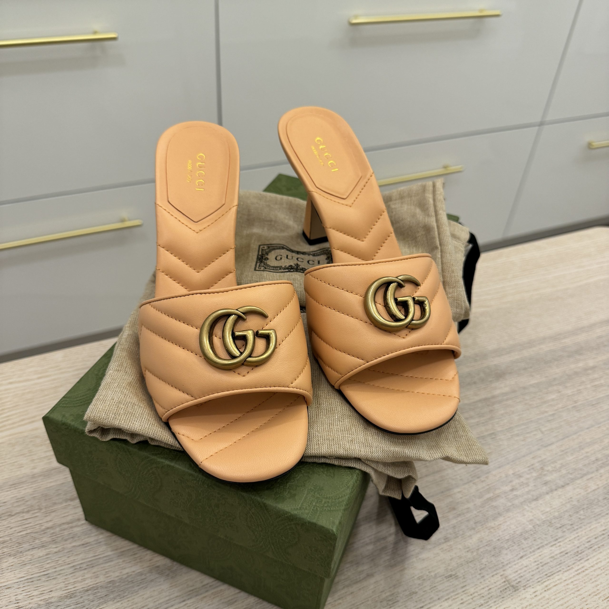 Gucci heel slides sales