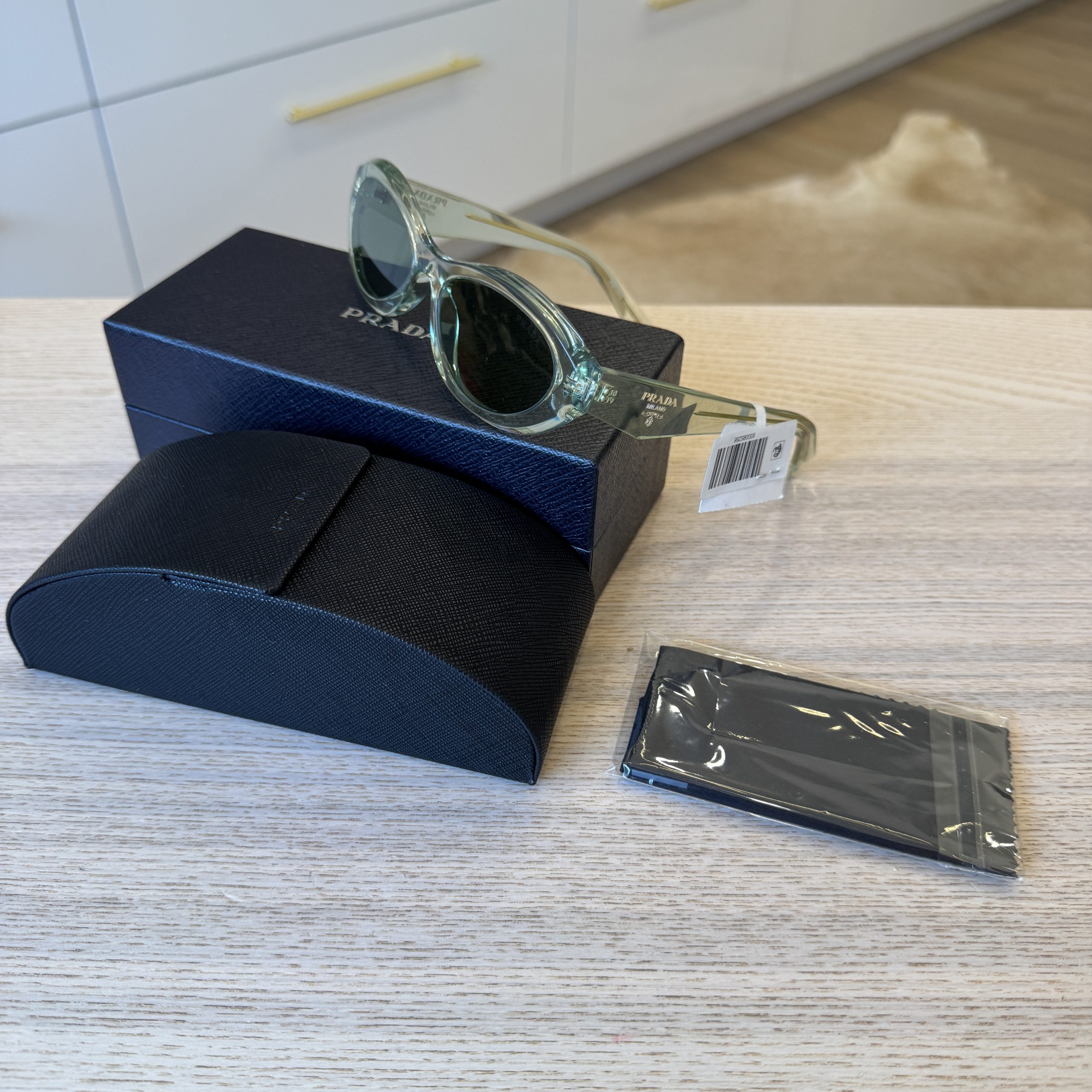 Prada 55 MM Irregular Sunglasses Transparent