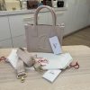 Christian Louboutin By My Side Mini Tote in Leather with CL Logo Leche