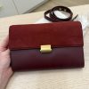 The Row Laurie Clutch in Lux Calfskin and Nubuck Red