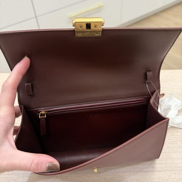 The Row Laurie Clutch in Lux Calfskin and Nubuck Red