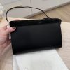 The Row Laurie Clutch in Lux Calfskin and Nubuck Black
