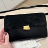 The Row Laurie Clutch in Lux Calfskin and Nubuck Black