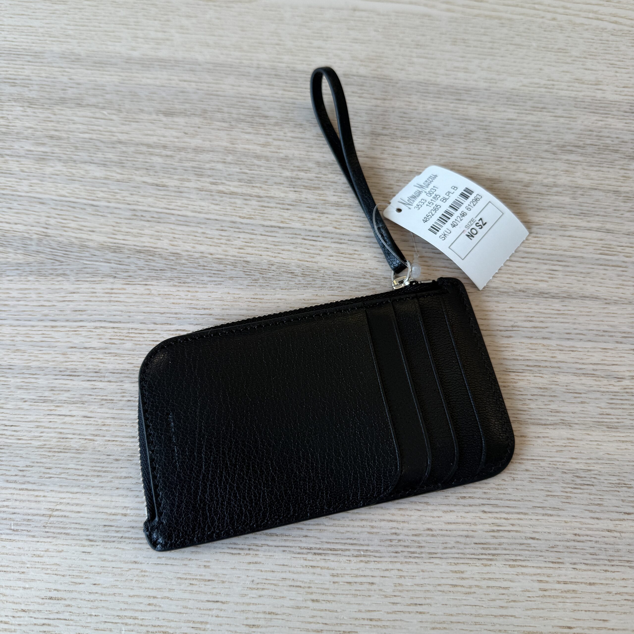 The Row Zipped Wallet in Shiny Kid Leather Black