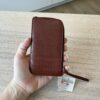 The Row Zipped Wallet in Shiny Kid Leather Burnt Umber