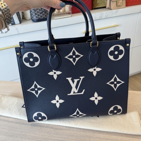 Louis Vuitton Empreinte Monogram Giant Onthego MM Navy and Creme and Silk Braided Bag Charm Multicolor