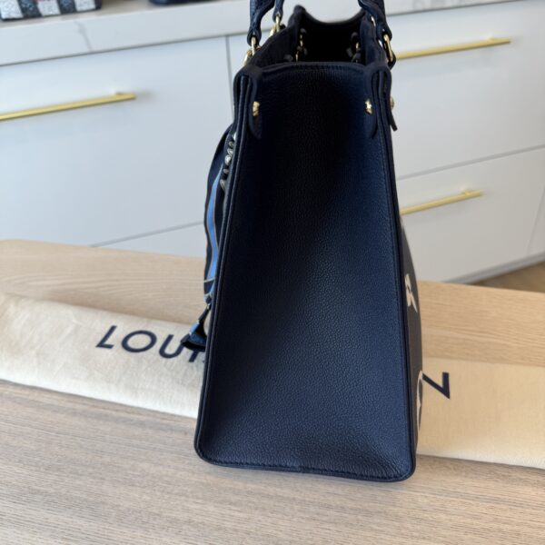 Louis Vuitton Empreinte Monogram Giant Onthego MM Navy and Creme and Silk Braided Bag Charm Multicolor