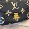 Louis Vuitton Bicolor Monogram Empreinte Leather Pochette Metis