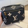 Louis Vuitton Bicolor Monogram Empreinte Leather Pochette Metis