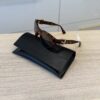 Moschino Oval Buckle Sunglasses Havana