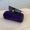 Gucci Black and Gold Sunglasses