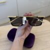 Gucci Black and Gold Sunglasses