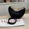 Valentino Garavani Small V Logo Moon Hobo Bag in Grainy Calfskin with Chain Black