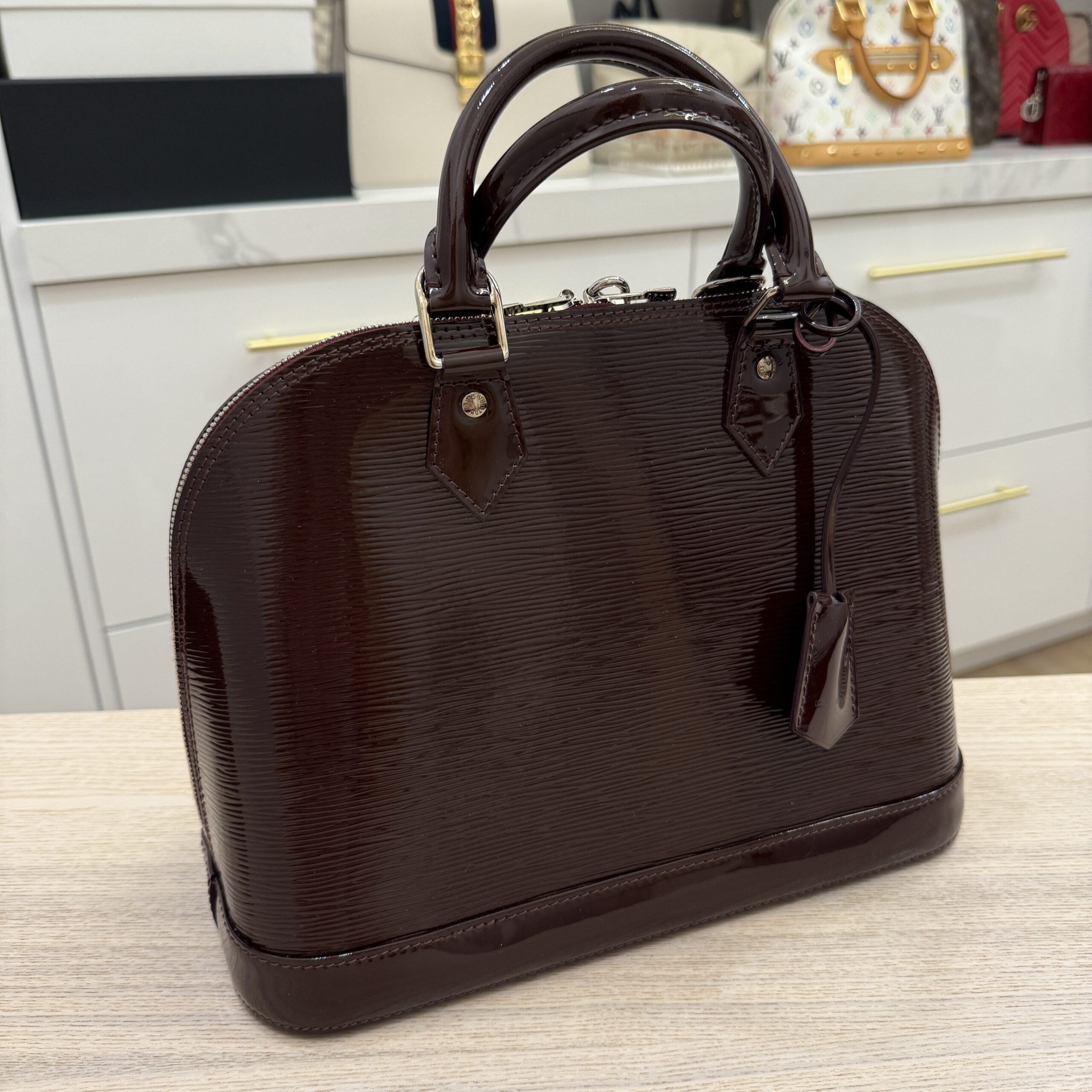 Louis Vuitton Electric Epi Alma PM Prune