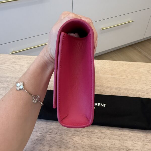 Saint Laurent (YSL) Pink Leather Cassandre Tassel Clutch Bag