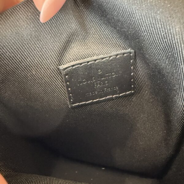 Louis Vuitton Monogram S Lock Vertical Wearable Wallet