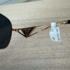 Prada Rose Gold Aviator Sunglasses