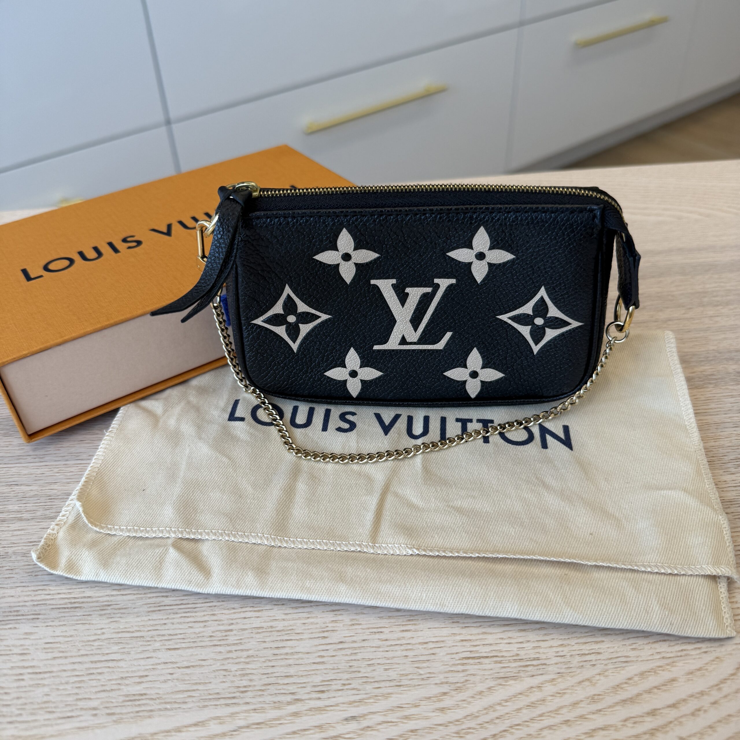 Louis Vuitton Pochette Accessoires Bicolor Monogram Empreinte Giant Mini Black and Creme