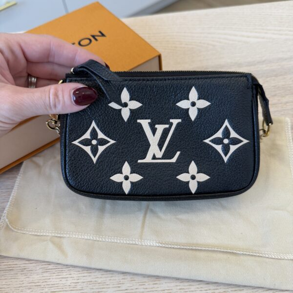 Louis Vuitton Pochette Accessoires Bicolor Monogram Empreinte Giant Mini Black and Creme