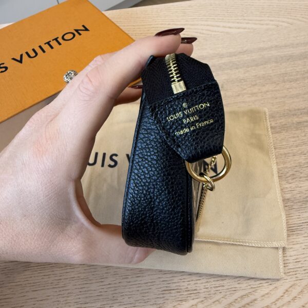Louis Vuitton Pochette Accessoires Bicolor Monogram Empreinte Giant Mini Black and Creme
