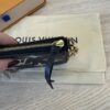 Louis Vuitton Pochette Accessoires Bicolor Monogram Empreinte Giant Mini Black and Creme