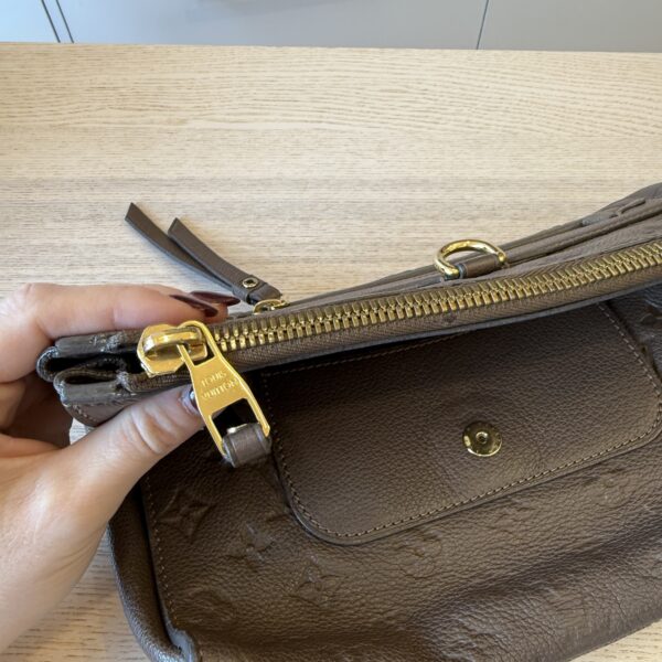 Louis Vuitton Empreinte Petillante Clutch Ombre