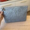Chanel Silver Metallic Camellia Embossed Leather O-Case Zip Large Pouch