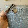 Chanel Silver Metallic Camellia Embossed Leather O-Case Zip Large Pouch