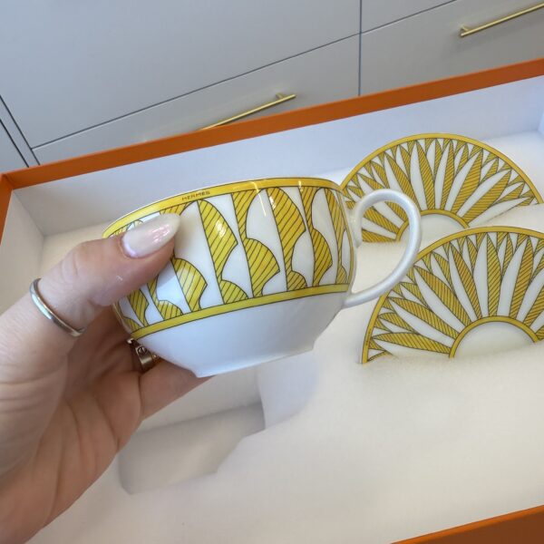 Hermes Soleil d’Hermès Tea Cup and Saucer
