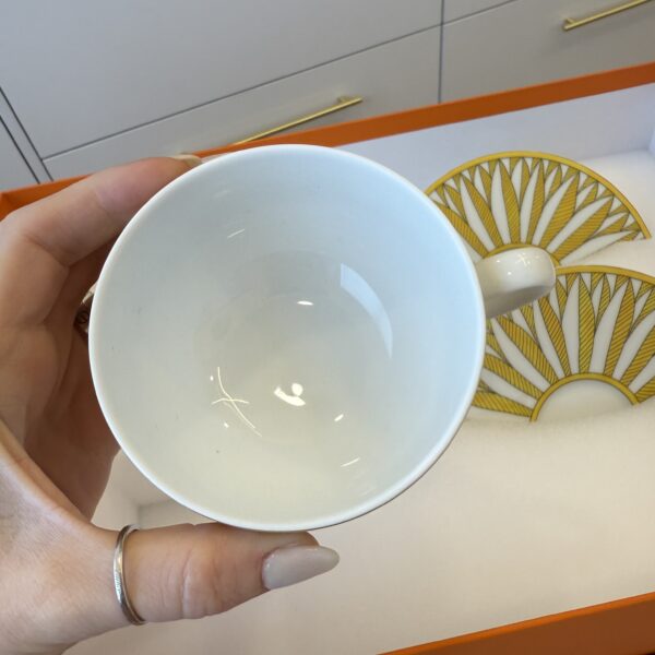 Hermes Soleil d’Hermès Tea Cup and Saucer