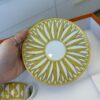Hermes Soleil d’Hermès Tea Cup and Saucer