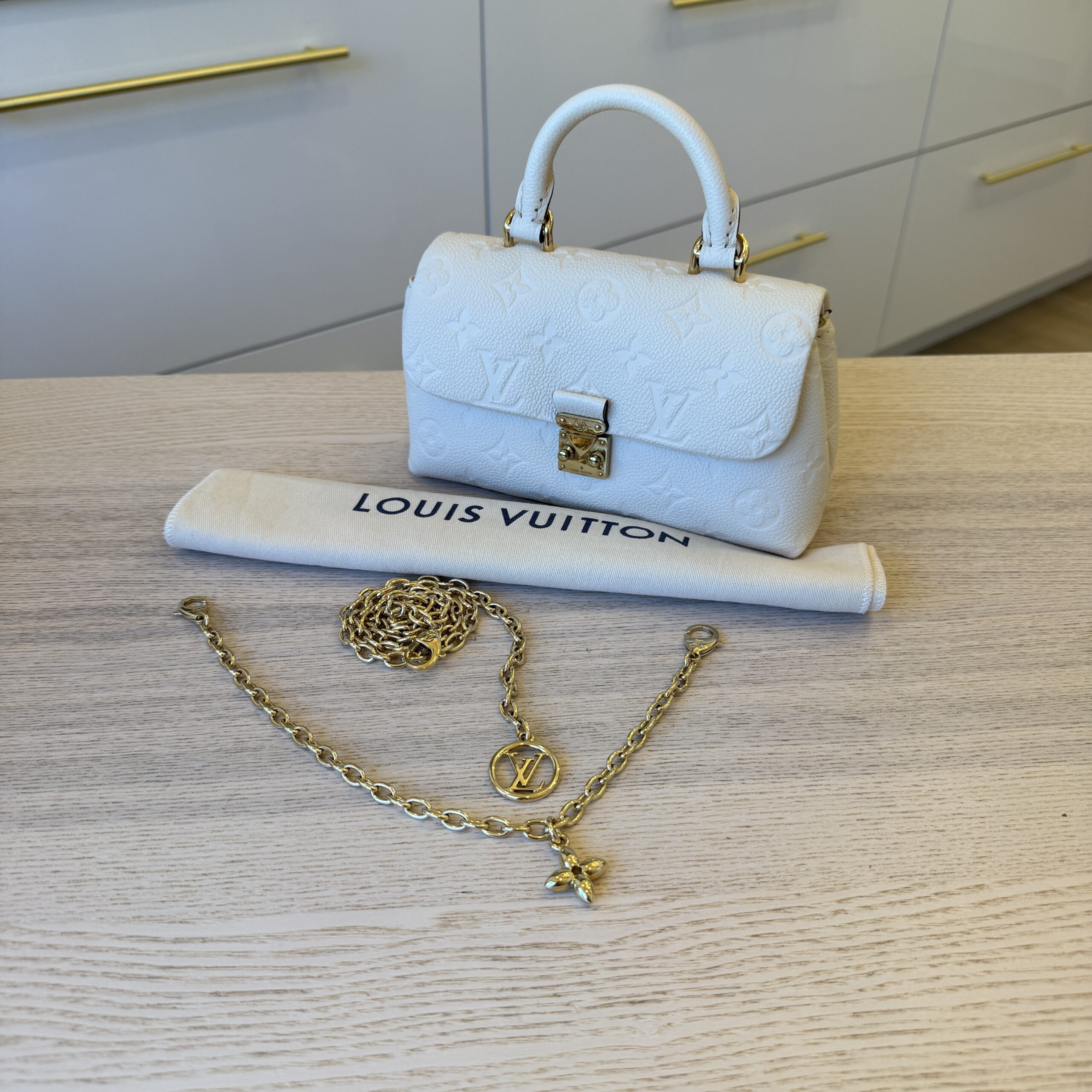 Louis Vuitton Monogram Empreinte Leather Nano Madeleine Ceme